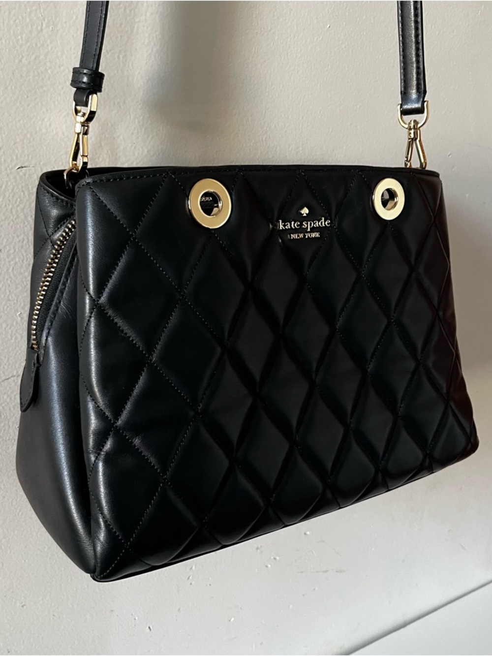 kate spade Black Quilted Leather Tote with Gold Grommets